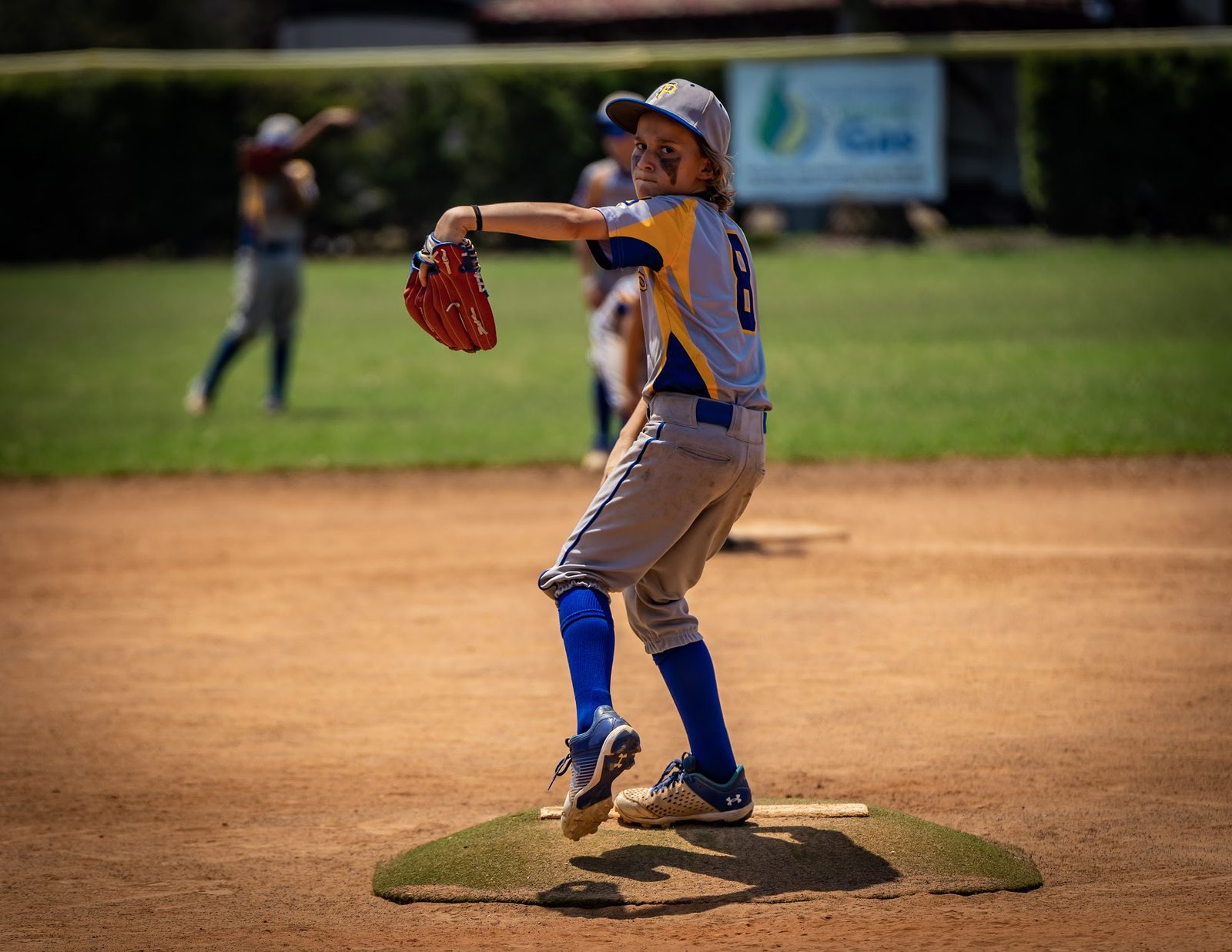 Baseball pitcher in action on the mound during a game